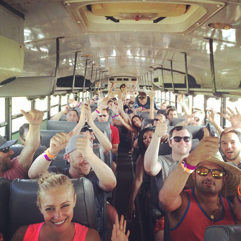 People on a bus going to the river